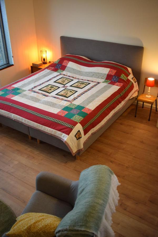B&B Houten Huis Назарет Екстериор снимка